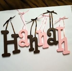 Wooden letters ' Hannah ' - pink and chocolate
